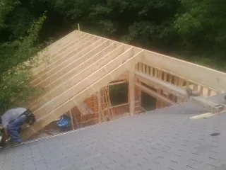 Framing a new roof addition that ties into an existing shingle roof in Burlington